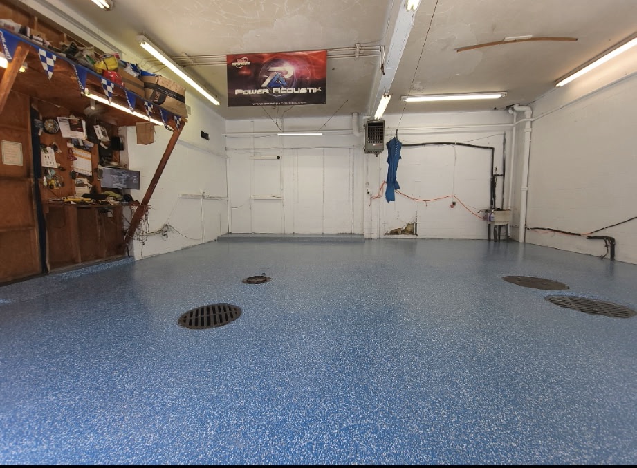 Blue flake epoxy garage floor in a Cuyahoga Falls, Ohio shop garage